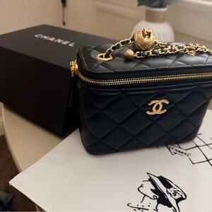 New with box CC logo Quilted black and gold bag